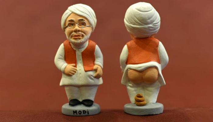 स्पेनमध्ये नरेंद्र मोदींची 'शेम शेम' मूर्ती... स्पेनमध्ये नरेंद्र मोदींची 'शेम शेम' मूर्ती...