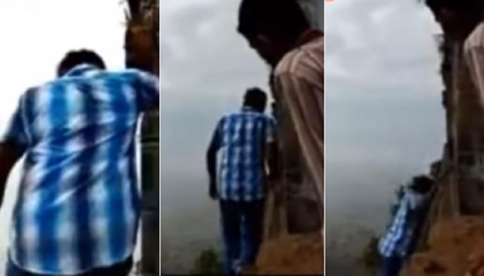 VIDEO: मंदिराभोवती प्रदक्षिणा घालताना तरुण दरीत कोसळला VIDEO: मंदिराभोवती प्रदक्षिणा घालताना तरुण दरीत कोसळला