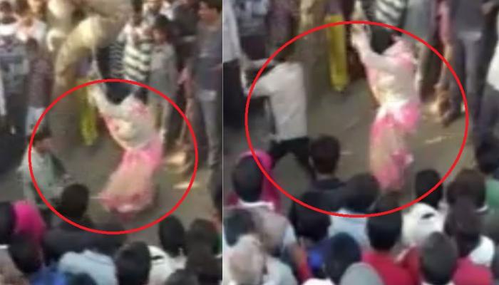 महिलेला झाडाला बांधून पतीने केली बेल्टने मारहाण, बघ्यांनी मदतीऐवजी केले VIDEO शूटिंग महिलेला झाडाला बांधून पतीने केली बेल्टने मारहाण, बघ्यांनी मदतीऐवजी केले VIDEO शूटिंग